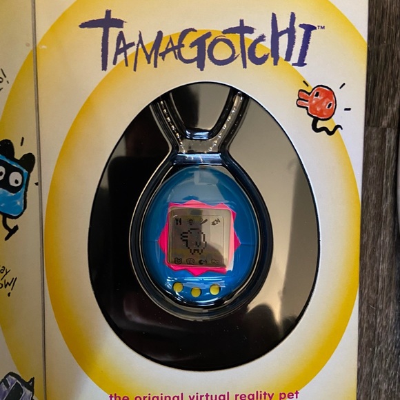 5 Vintage Tamagotchis;gold,green, white,yellow/black,blue/pink-unopened in boxes - Picture 3 of 6